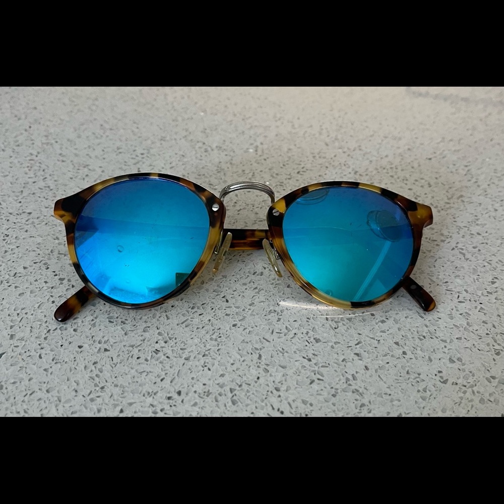 Beautiful blue mirrored lenses, Italian made glasses with tortoise shell frames.